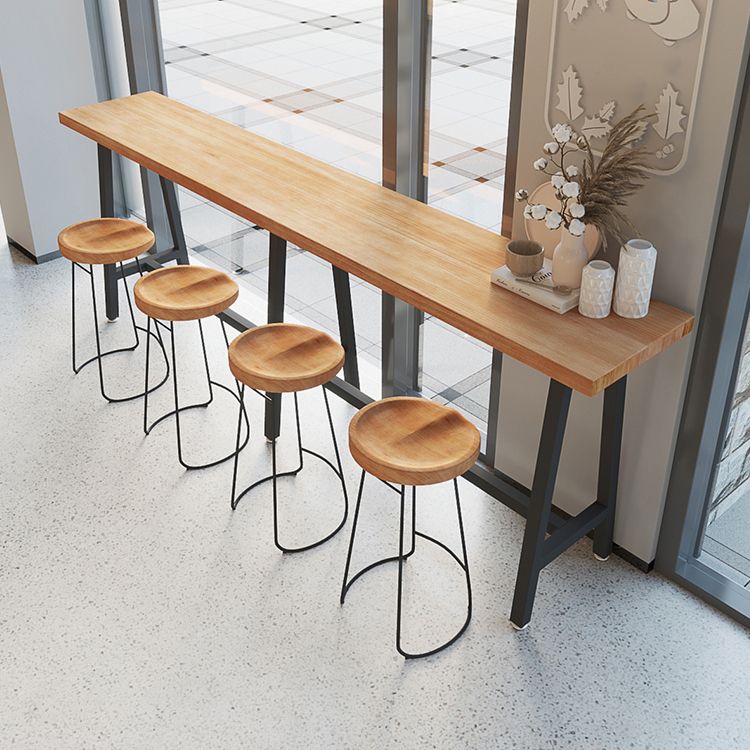Brown Modern Style Bar Table Solid Wood and Black Iron Foot Coffee Shop Bar Table Clearhalo 'Bar Furniture' 'Bar Tables' 'bar_tables' 'furn' 'furn_bar_tables' 'Furniture' 'furniture_bar_tables' 'Kitchen & Dining Furniture' 'kitchen&dining_furn' 'kitchen' 1200x1200_cb3f8fc4-2b71-48c4-93a4-6874a96efeef