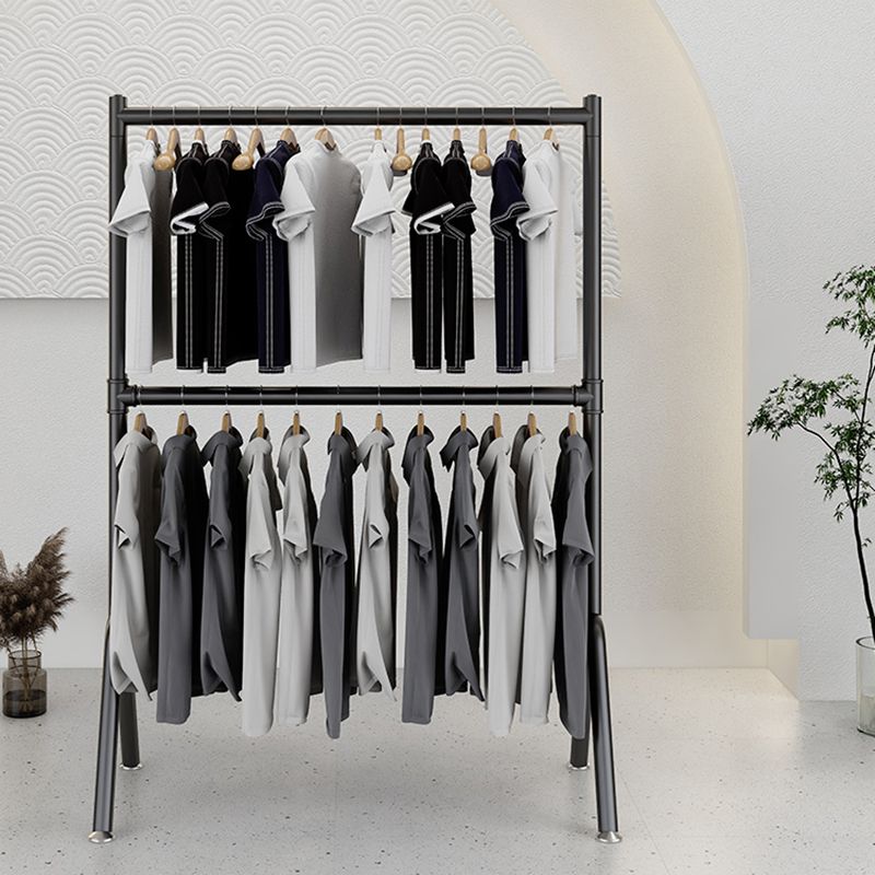 Eigentijdse hal staande hangende rails en castors metaal ingelijste jashanger