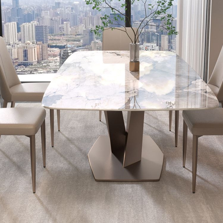 椅子付きの現代的な長方形の焼結された石のトップメタルベースダイニングテーブル