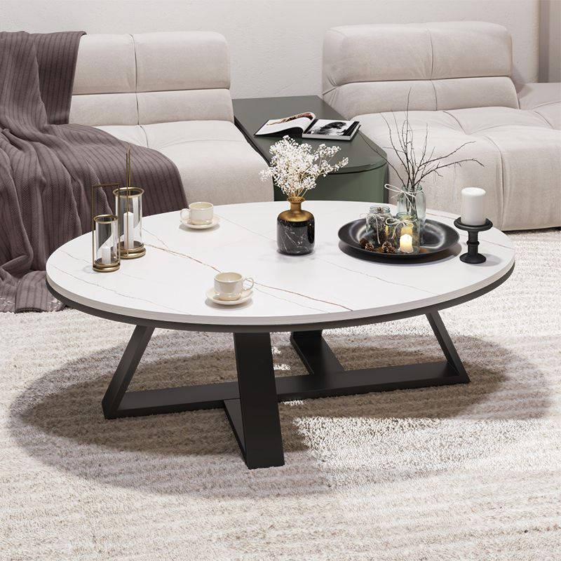 Glam Oval Stone Top Couchtisch mit Eisenkreuz -Basis -Cocktailtisch