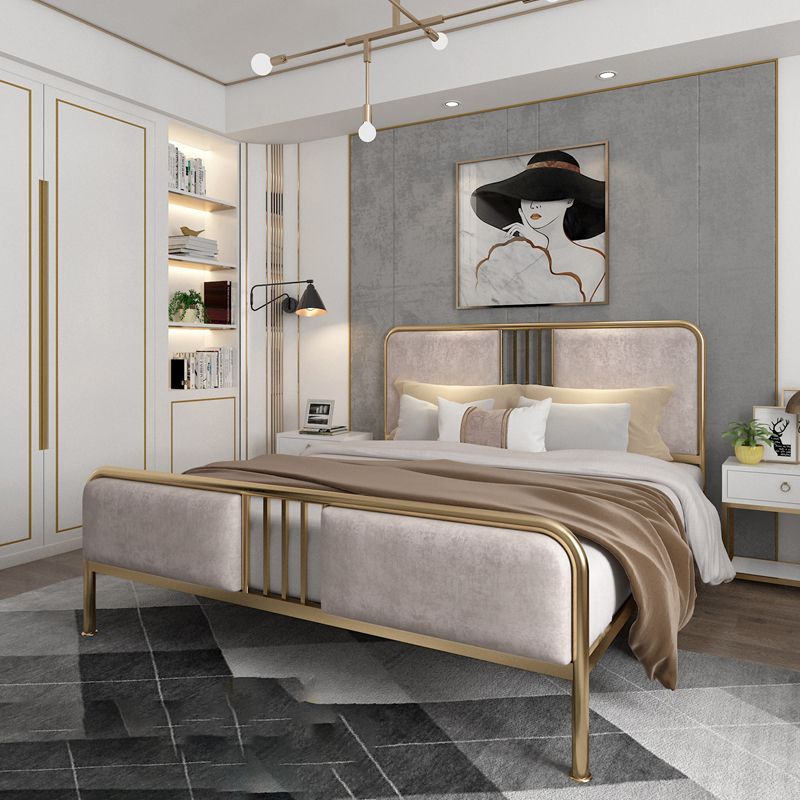 Letto in metallo imbottito con testiera a basso profilo con gambe metalliche