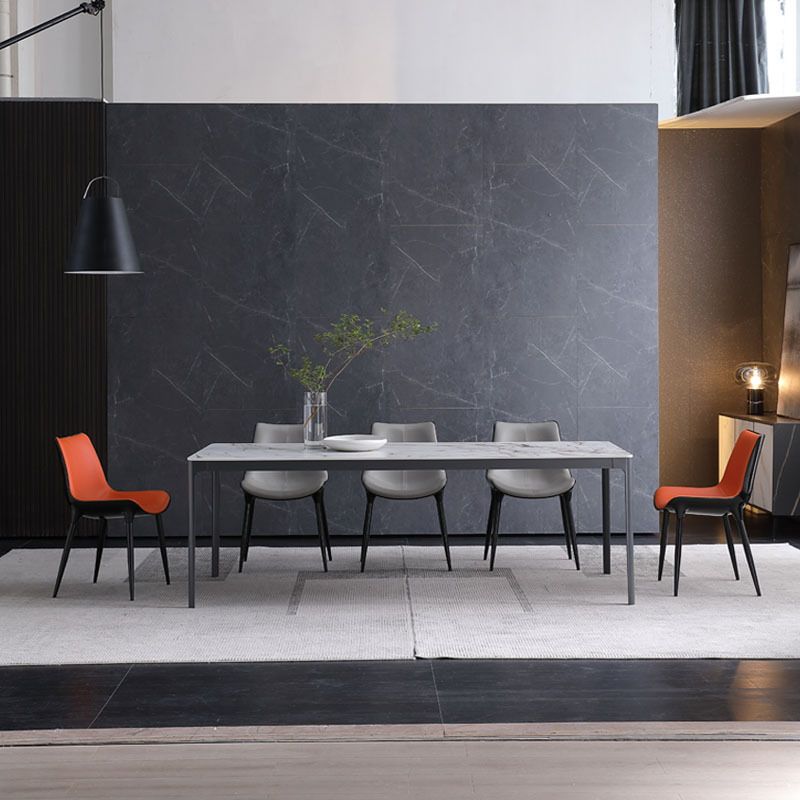家のための4本の脚の焼結された石のテーブルを備えた金属の現代的な長方形のダイニングテーブル