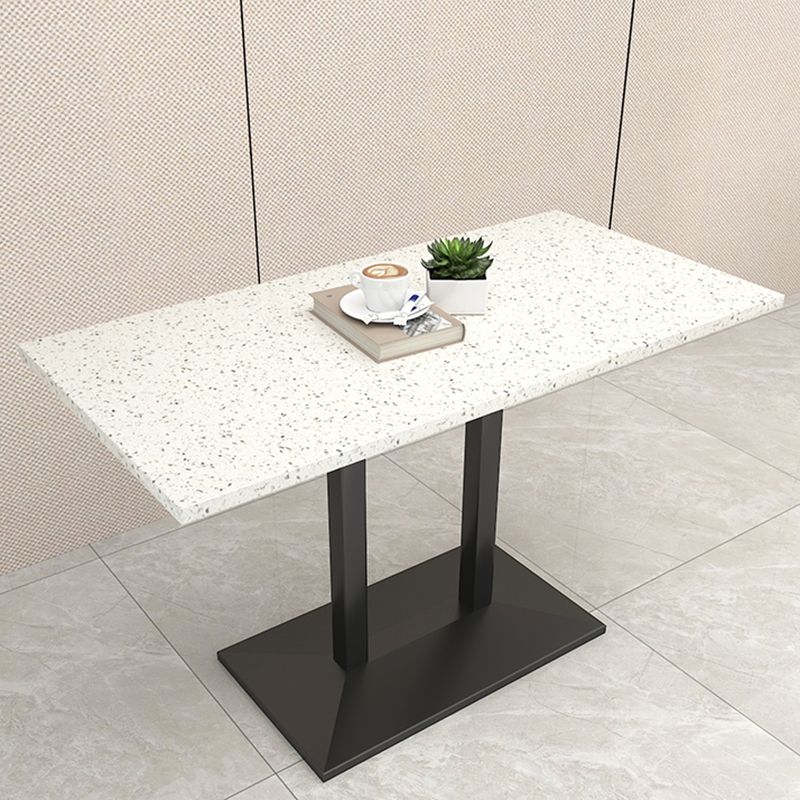 Mesa de comedor de piedra geométrica moderna con base metálica para comedor