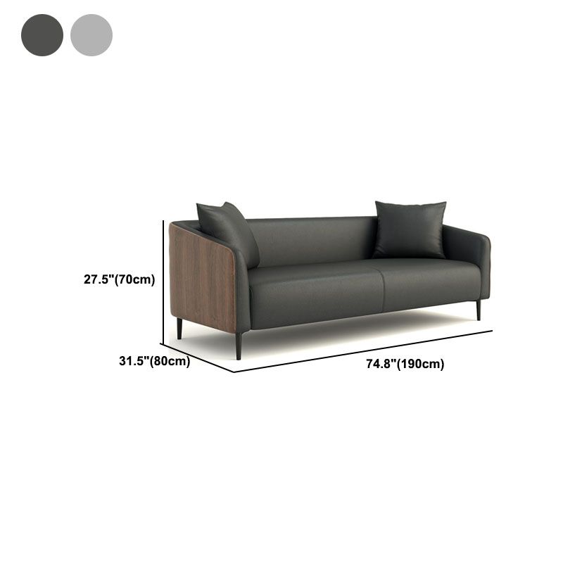 モダニズムフェイクレザーソファタキシードアームソファと木目アクセント