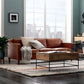 Industrial Faux Leather Loose Back Sofa with Solid Color Sloped Arms Clearhalo 'furn' 'furn_sofas' 'Furniture' 'furniture_sofas' 'kitchen' 'kitchen_sofas' 'Living Room Furniture' 'Sofa' 'sofas' 1200x1200_cead097e-6406-44cc-9a30-6bfe438a1699