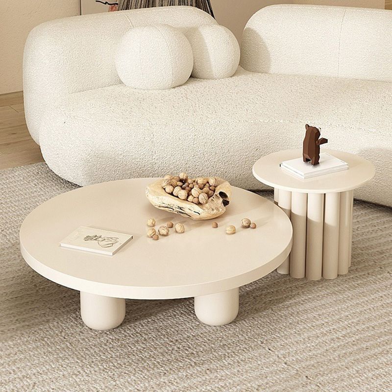 Skandinavischer runder Couchtisch aus Holz mit 4 Beinen / Sockel-Cocktailtisch
