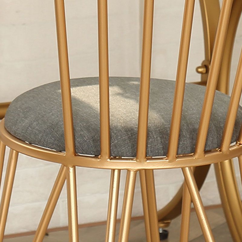 Eigentijdse metalen eetkamerstoelen Slat achter eetstoel in goud