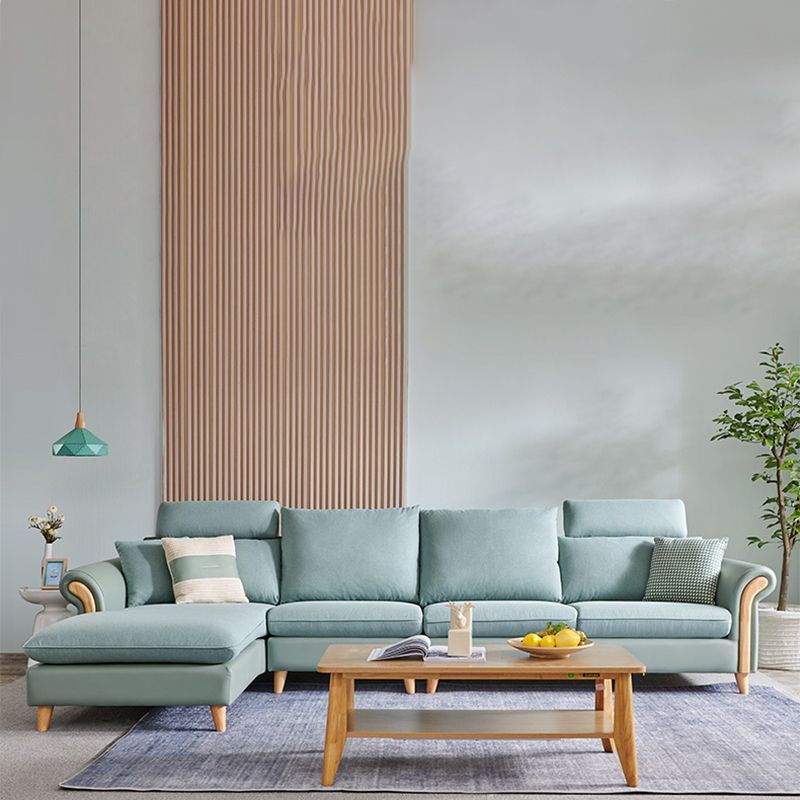 Sezionali di tessuto posteriore a cuscinetto svasato con un divano scandinavo con chaise