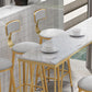Table de pub de bistro moderne à hauteur de bar avec plateau en faux marbre et base dorée