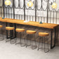 Tavolo industriale da bar con piano in legno massello, tavolo da pub bistrot con base nera