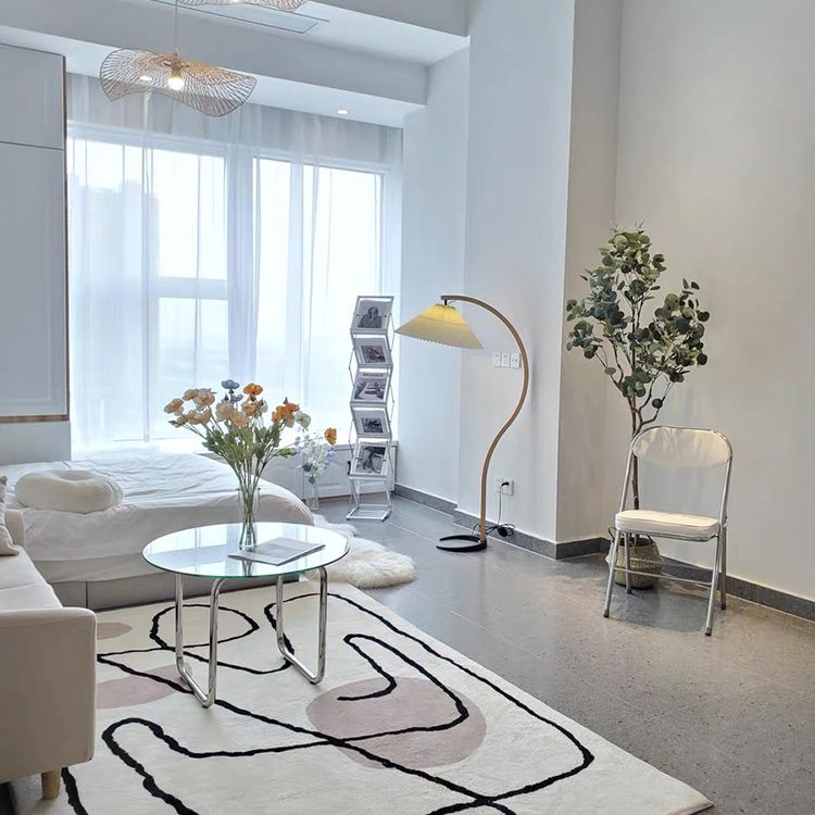 Modern Round Cocktail Table with Glass Top and Steel Sled Base