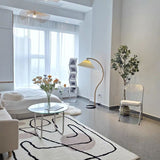 Modern Round Cocktail Table with Glass Top and Steel Sled Base