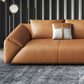 Orange Faux Ledersofa moderne Kissen -Oberarm -Sofa mit Kissen