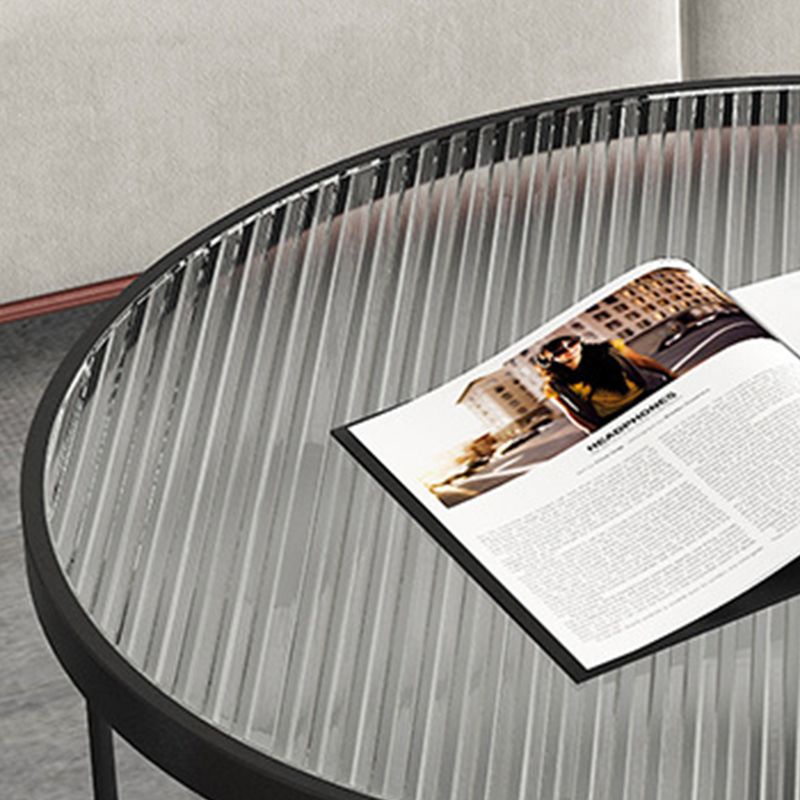 Tavolino contemporaneo di caffettiera con nidificazione rotonda con top in vetro e base di ferro