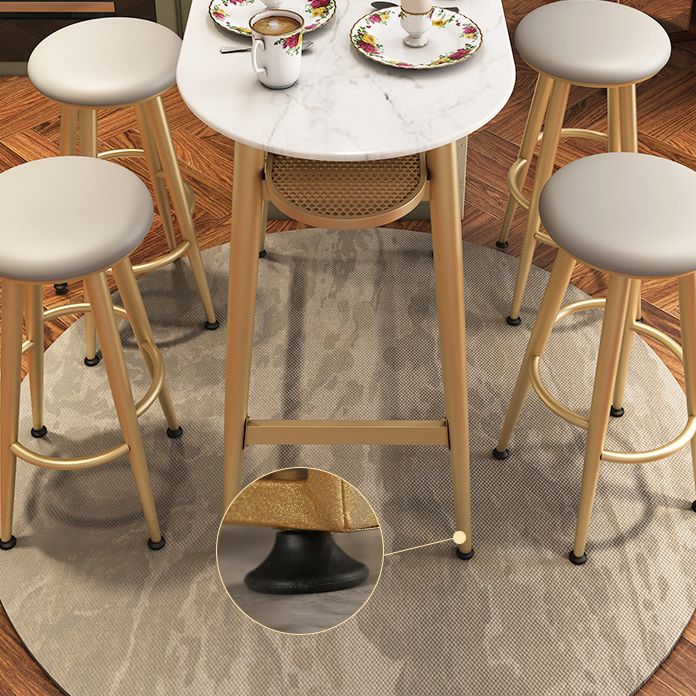 Stone Indoor Glam Bar Dining Table Iron Four Leg Pedestal Bistro Table with Footrest Clearhalo 'Bar Furniture' 'Bar Tables' 'bar_tables' 'furn' 'furn_bar_tables' 'Furniture' 'furniture_bar_tables' 'Kitchen & Dining Furniture' 'kitchen&dining_furn' 'kitchen' 1200x1200_d57f6d51-626a-465b-b2df-c84b63d2107b