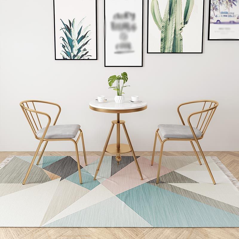 Tavolo da pranzo rotondo tradizionale tavolo in marmo con base in metallo oro