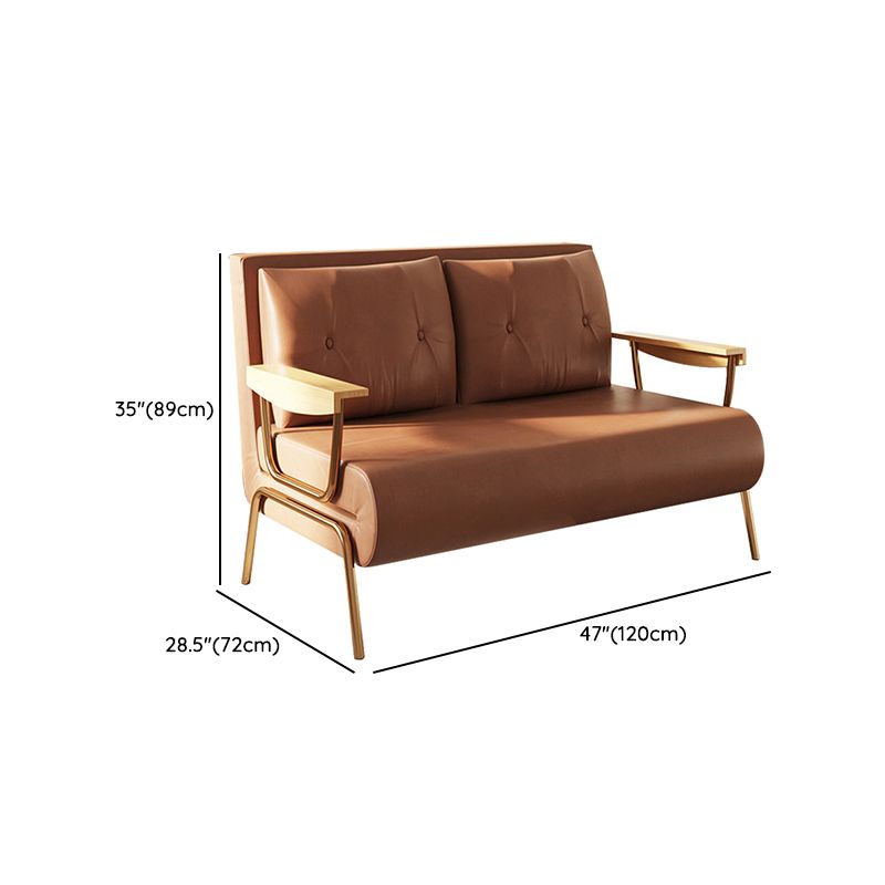 Sofá de durmiente de Futon Futon Glam Faux en almohada naranja incluida