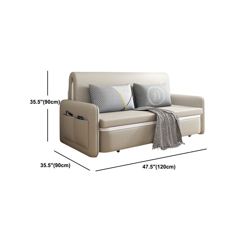 Sofá moderno de cuero de color beige color beige con almacenamiento de bolsillo