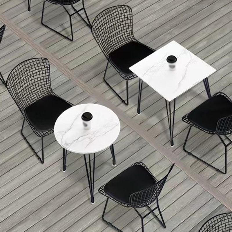Mesa de comedor al aire libre con trípode Mesa de cena moderna con base metálica y tapa de piedra
