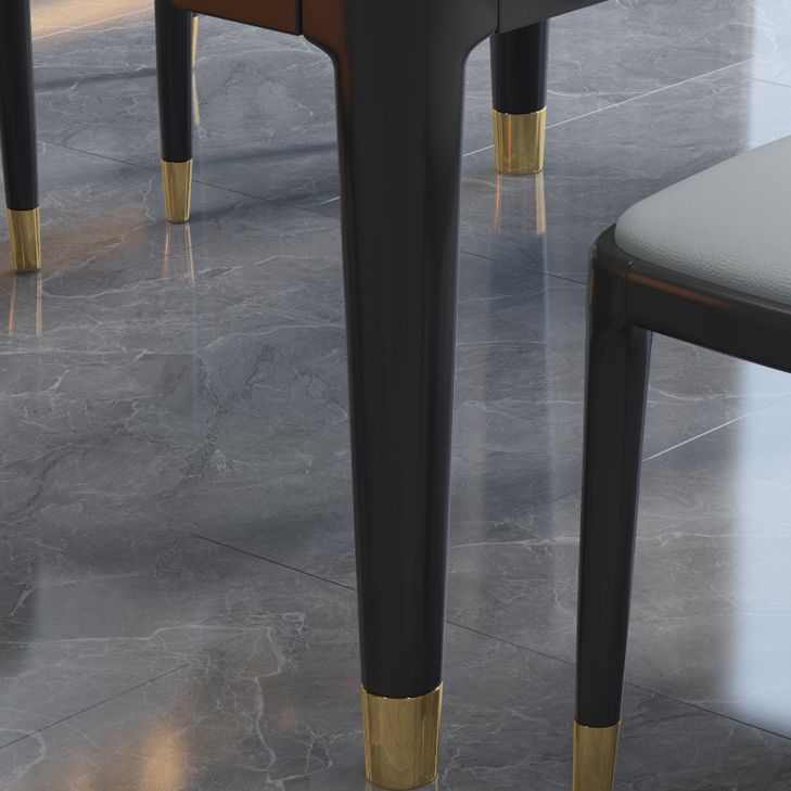 Luxe ronde grijze stenen topverlenging eettafel met 4 zwarte en gouden poten