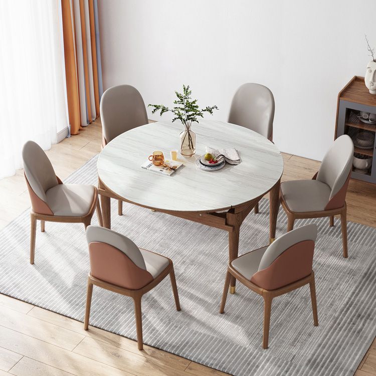 Tavolo da pranzo moderno scalabile in pietra con gambe in legno massello per sala da pranzo