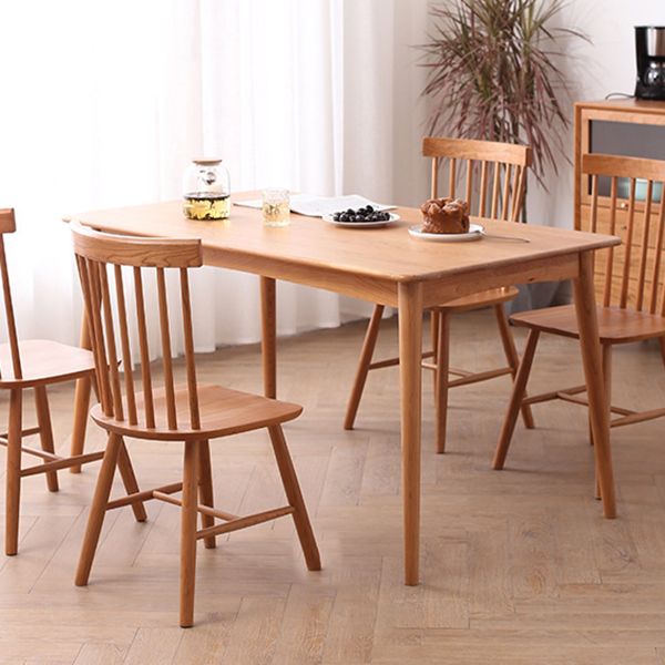 Solid Wood Modern Dining Table Brown Rectangle Table with 4 Legs for Home Use Clearhalo ' dining_table' 'Dining Tables & Seating' 'Dining Tables' 'Furniture' 'furniture_dining_table' 'Kitchen & Dining Furniture' 'kitchen&dining_furn' 'kitchen' 'kitchen_dining_table' 1200x1200_dd56bb2e-f793-49ef-8bef-e5b8bb1482a1