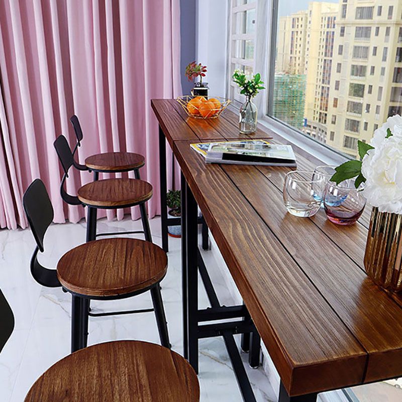 Industrial Brown Pine Bar Dining Table Rectangle Indoor Bistro Table with Footrest Clearhalo 'Bar Furniture' 'Bar Tables' 'bar_tables' 'furn' 'furn_bar_tables' 'Furniture' 'furniture_bar_tables' 'Kitchen & Dining Furniture' 'kitchen&dining_furn' 'kitchen' 1200x1200_dda20855-1977-4c93-9baf-5f79730cf36c