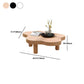 Table basse scandinave de forme libre avec 3 pieds en bois de pin
