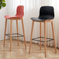 Tabouret de bar en plastique bas du style bas du style bas avec jambe en bois