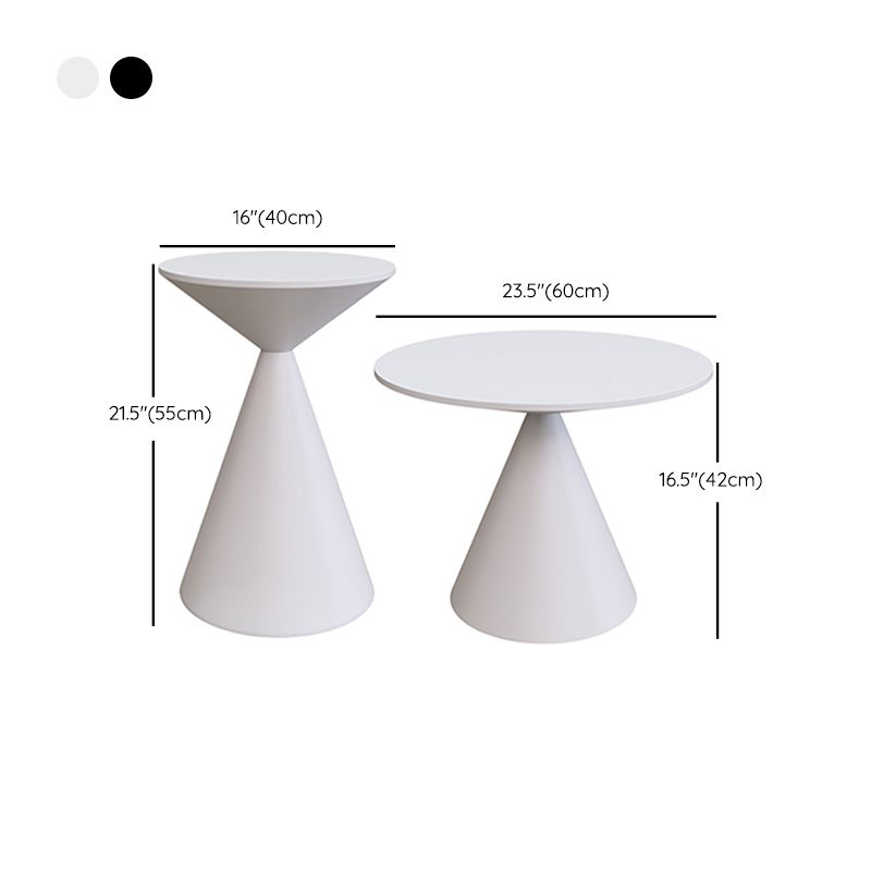 Moderne zwart/witte salontafel met ronde bovenkant, ijzeren voetstuk, cocktailtafel uit het midden van de eeuw