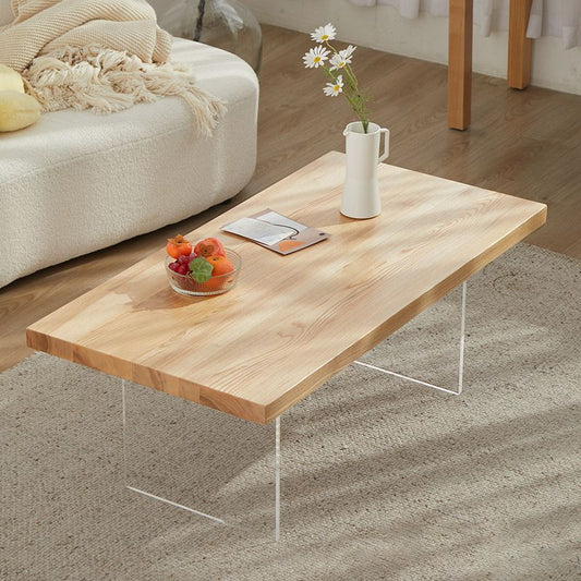 スカンジナビアの長方形のコーヒーテーブルは、固体木材と2つのアクリル脚を備えたコーヒーテーブル