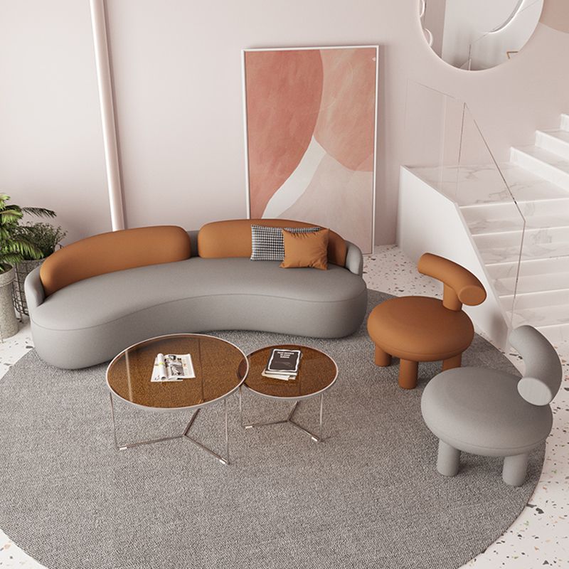 Sofá de almohada cosida curvada moderna de asiento sin brazo en gris y naranja