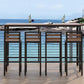Mesa industrial con altura de barra, patas negras y mesa de bar con base metálica
