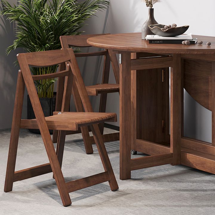 Mid-Century Modern Dining Table Brown Round Solid Wood Dining Table for Home Clearhalo ' dining_table' 'Dining Tables & Seating' 'Dining Tables' 'furn' 'furn_dining_table' 'Furniture' 'furniture_dining_table' 'Kitchen & Dining Furniture' 'kitchen&dining_furn' 'kitchen' 'kitchen_dining_table' 1200x1200_e3fc9401-c1b9-48c2-adb1-adcec5afdd95
