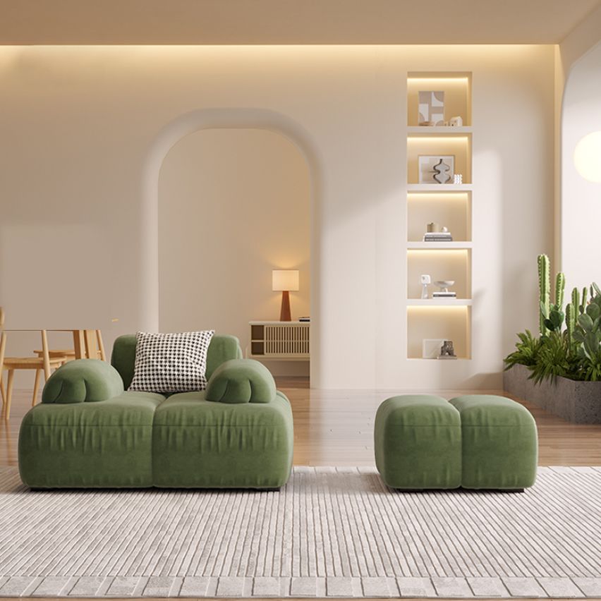 Sedute scandinaviane in finta pelle verde trapuntata braccio salotto