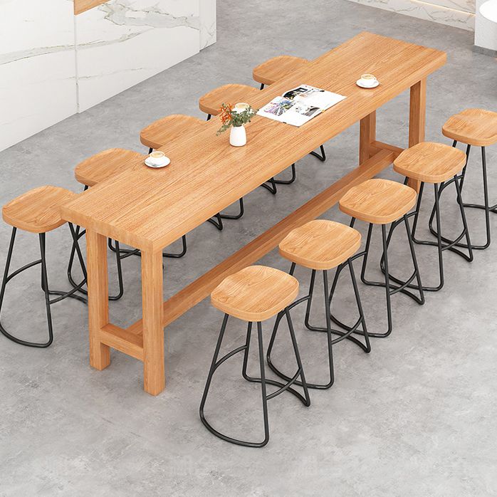 Modern Beige Wood Bar Dining Table Rectangle Indoor Bistro Table with Footrest Clearhalo 'Bar Furniture' 'Bar Tables' 'bar_tables' 'furn' 'furn_bar_tables' 'Furniture' 'furniture_bar_tables' 'Kitchen & Dining Furniture' 1200x1200_e480548f-60a5-45cc-91cd-41e1caee97d2