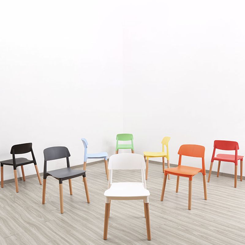 Plastic Stackable Armless Dining Chairs Open Back Side Chair with Wood Legs Clearhalo ' kitchen&dining_furn' 'Dining Chairs' 'Dining Tables & Seating' 'dining_chair' 'furn' 'furn_dining_chair' 'Furniture' 'furniture_dining_chair' 'Kitchen & Dining Furniture' 'kitchen' 1200x1200_e49b293b-ce4a-443a-a8a1-ef10cc1e938c