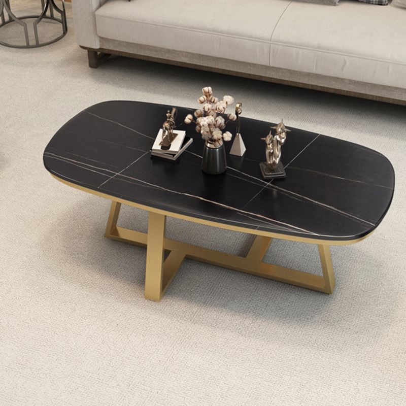 Table basse à jambes croisées en pierre 1 table de cocktail ovale unique