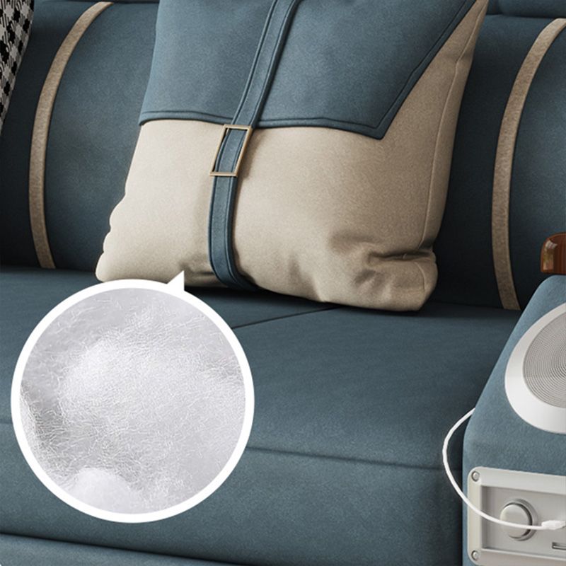 Canapé-lit bleu scandinave avec rangement et coussin en arrière