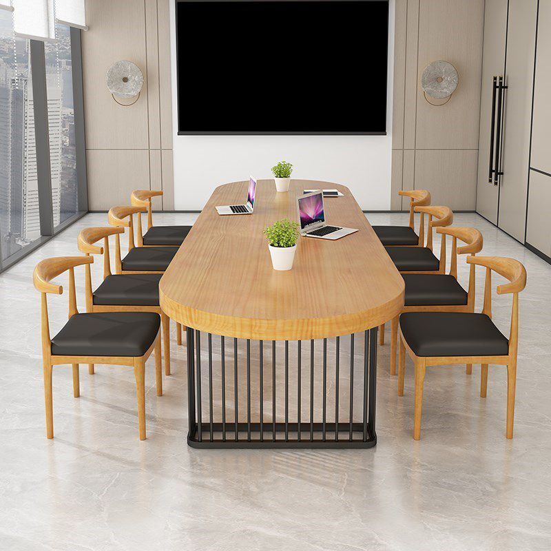 ソリッドウッドライティングデスクインダストリアルスタイルの楕円形のそりベースオフィスデスク