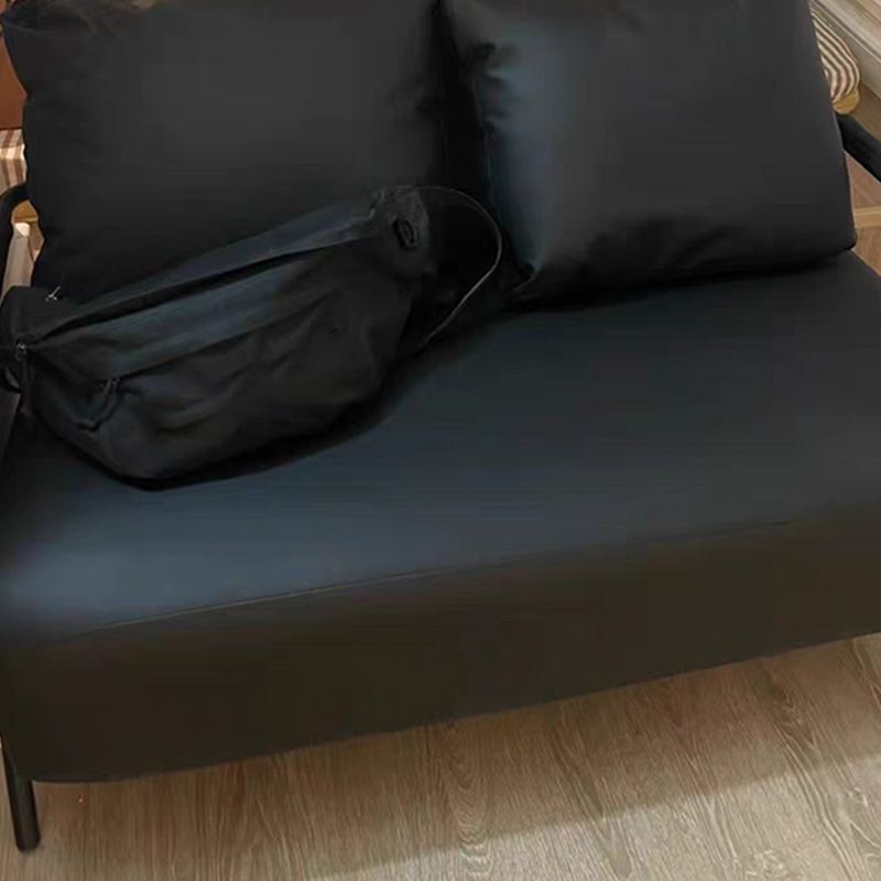 Sofá de metal con almohadas de refuerzo contemporáneas con asientos de cuatro patas