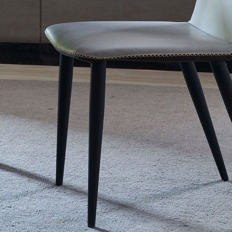 Sedia da pranzo contemporanea finitura opaca in pelle curva sedia a braccialess