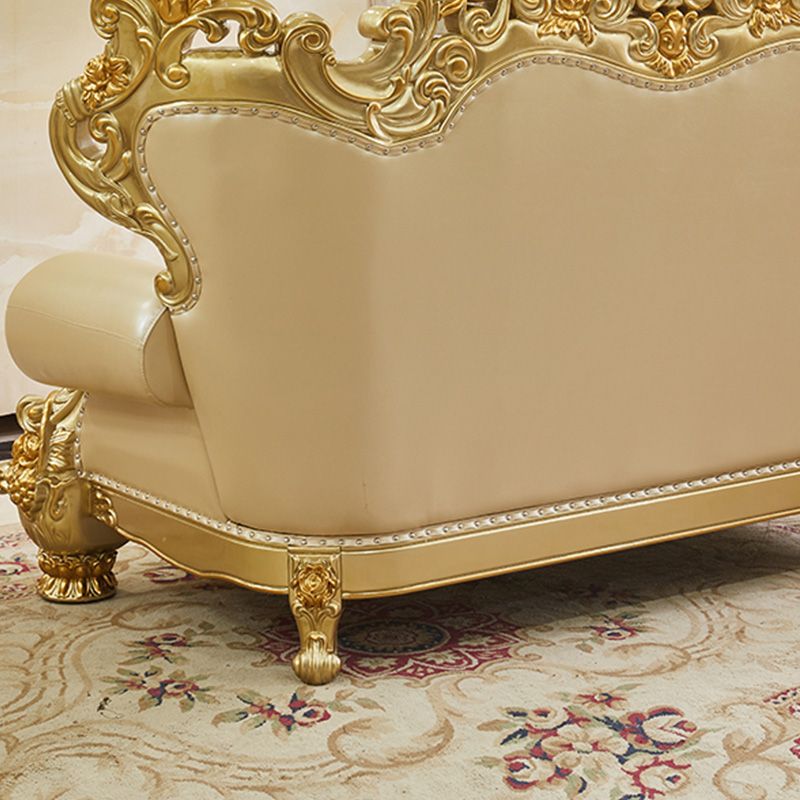 ゴールドの本革ソファ房式スプリットバックロールアームソファリビングルーム用