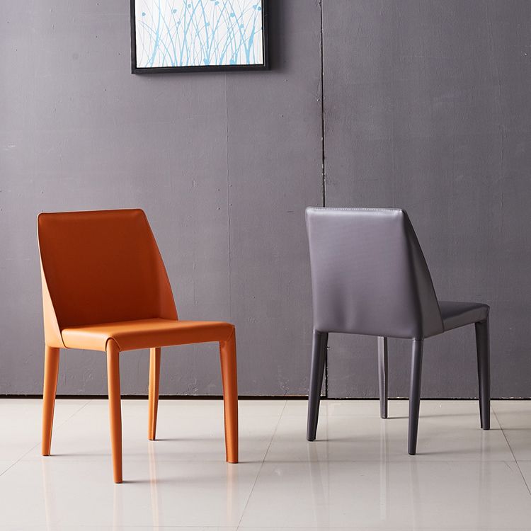 Silla de comedor de cuero de diseño minimalista para silla de espalda sólida en el hogar