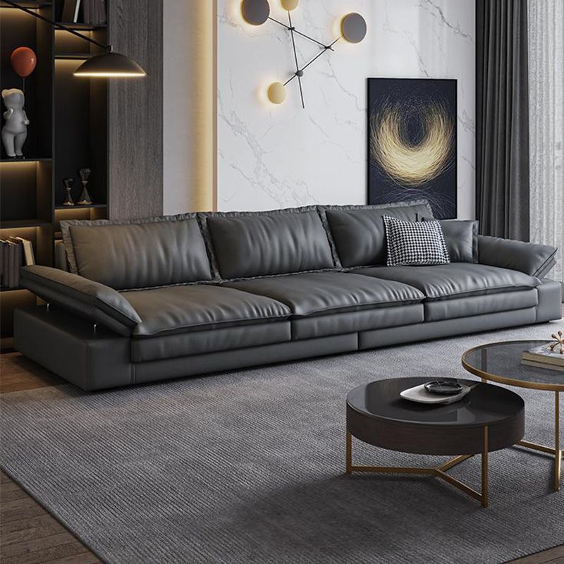 Canapé noir moderne du milieu du siècle avec un bras toret et dos lâche