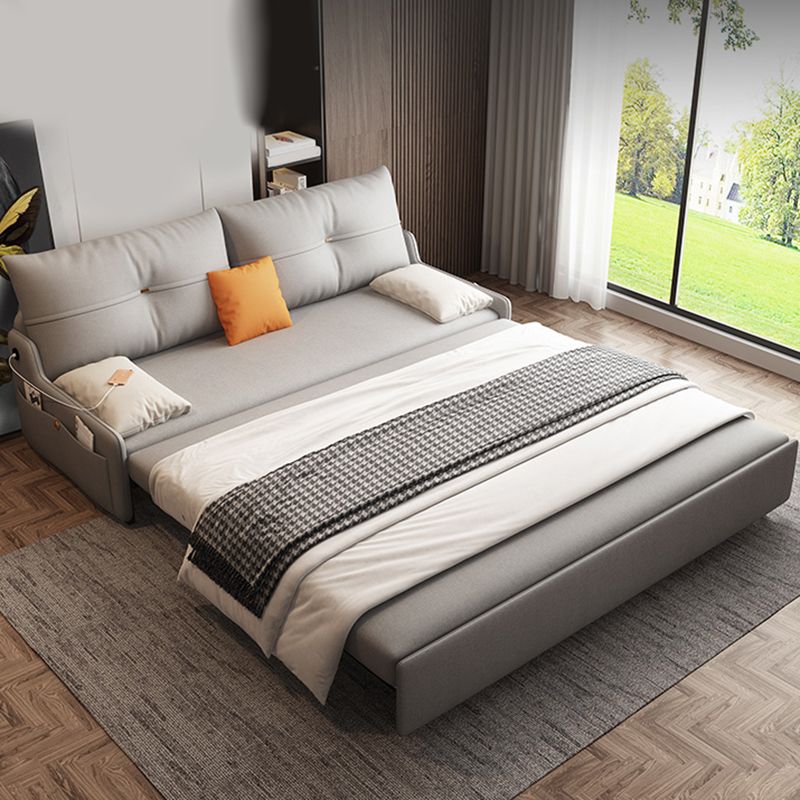 Canapé-lit gris gris futon avec dos touflé et rangement en faux cuir