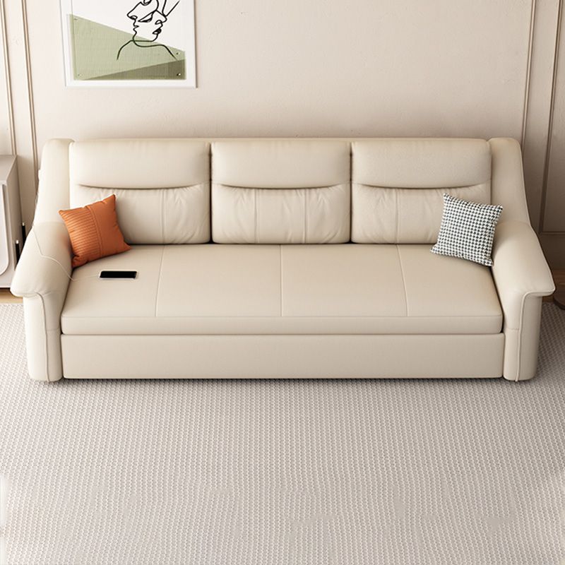 Canapé-lit beige futon beige de style glamour avec dos lâche en cuir collé