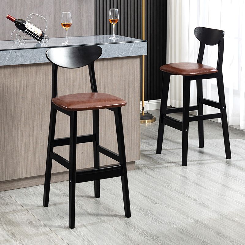 Sgabelli da bar imbottiti da bar in legno solido industriale con gambe nere