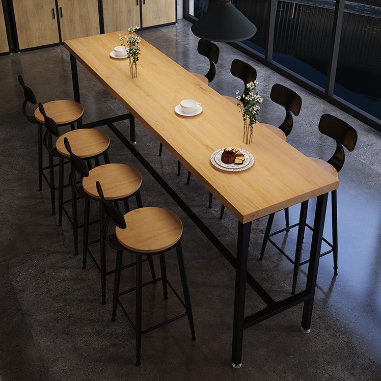 Solid Wood Bar Dining Table Industrial Bar Dining Table with Black Trestle Base Clearhalo 'Bar Furniture' 'Bar Tables' 'bar_tables' 'furn' 'furn_bar_tables' 'Furniture' 'furniture_bar_tables' 'Kitchen & Dining Furniture' 1200x1200_eecd183b-46b5-4910-92cd-34b3b5a8ad78