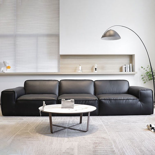 枕付きの現代的な黒い本物の革の四角いアームソファ